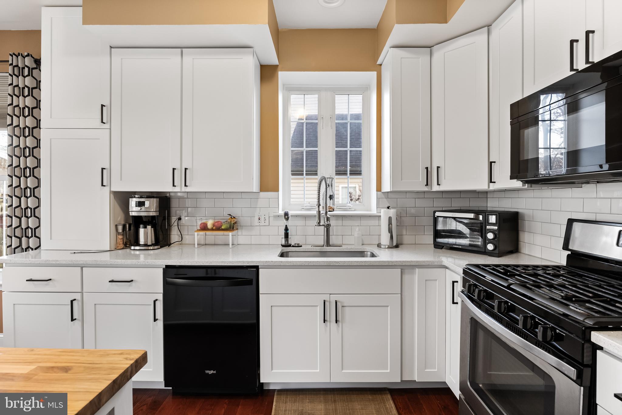 6 Read Drive Sicklerville, NJ 08081 - Photo 10 of 36 a kitchen with white cabinets and appliances
