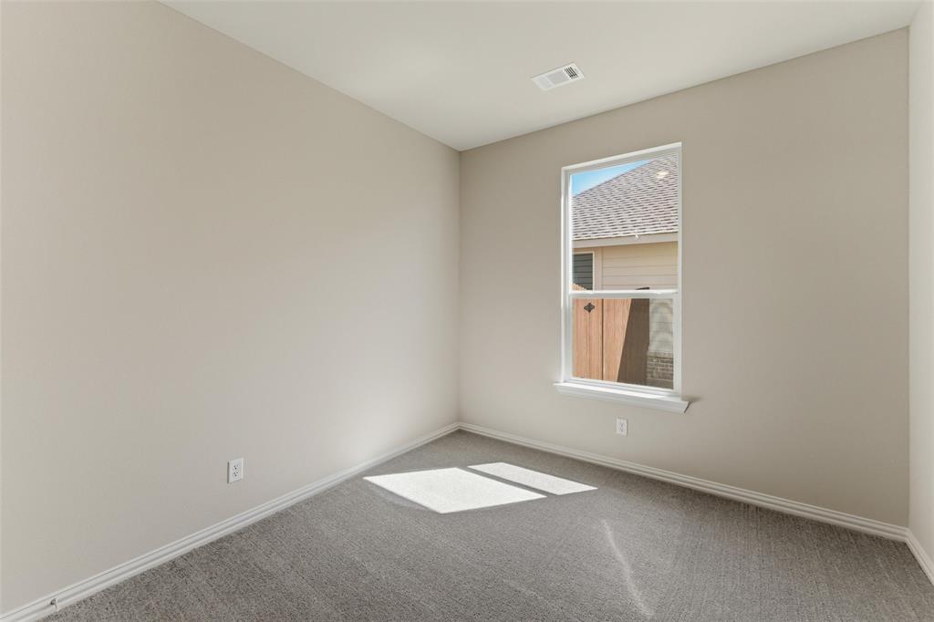 1229 Sabine River Lane Springtown, TX 76082 - Photo 14 of 26 an empty room with a window