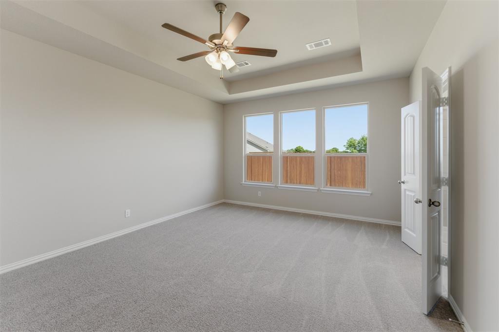 1229 Sabine River Lane Springtown, TX 76082 - Photo 16 of 26 an empty room with a window