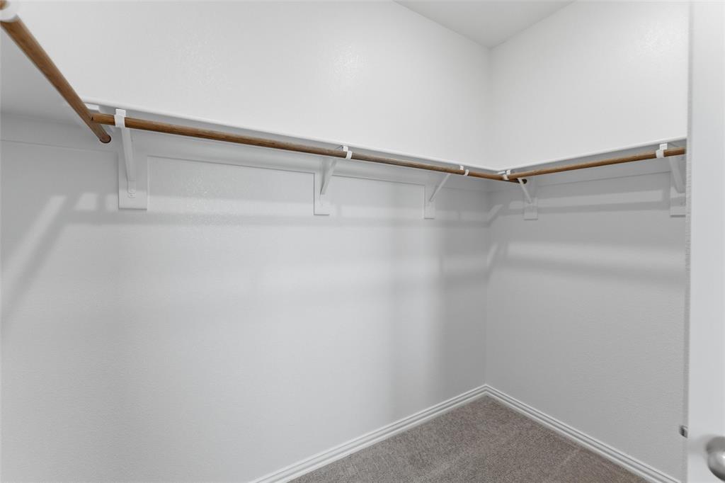 1229 Sabine River Lane Springtown, TX 76082 - Photo 19 of 26 a view of an empty walk in closet