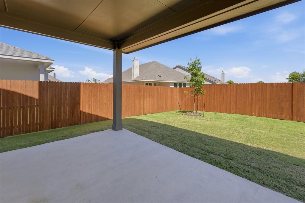 1229 Sabine River Lane Springtown, TX 76082 - Photo 20 of 26 a view of a backyard