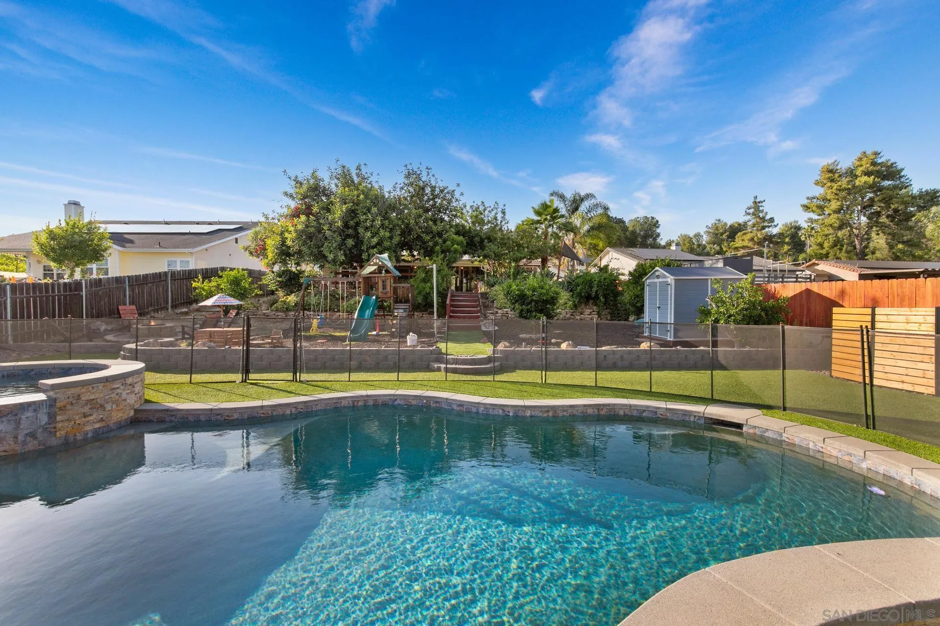 23849 Gymkhana Road Ramona, CA 92065 - Photo 14 of 57 a view of a swimming pool with an outdoor seating