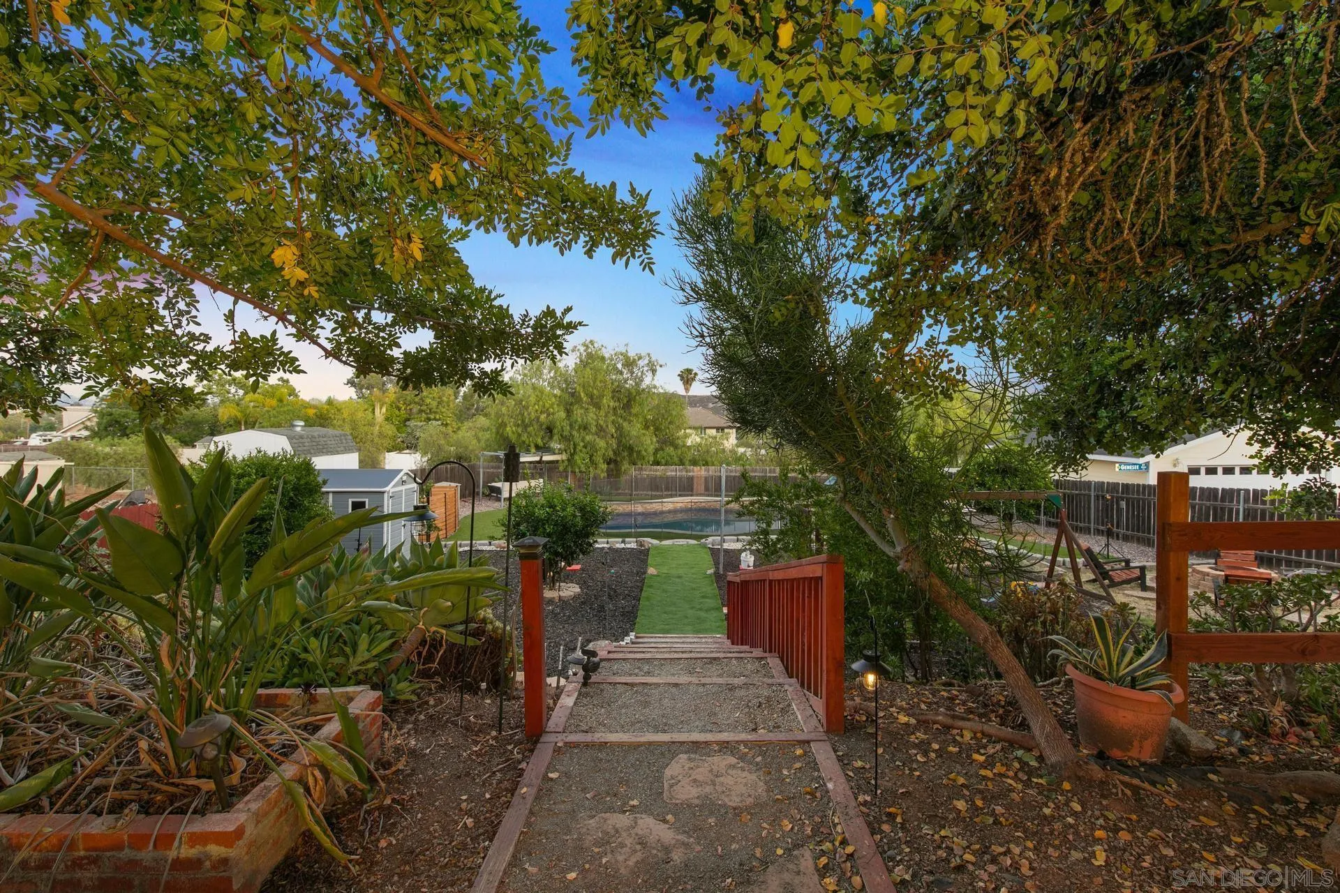 23849 Gymkhana Road Ramona, CA 92065 - Photo 18 of 57 a backyard of a house with lots of green space