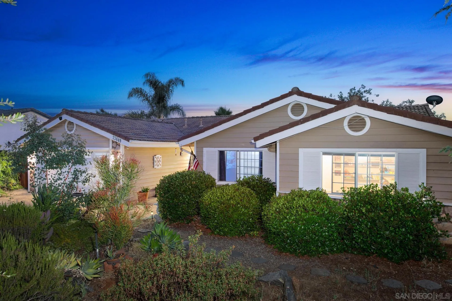 23849 Gymkhana Road Ramona, CA 92065 - Photo 2 of 57 a front view of a house with a yard
