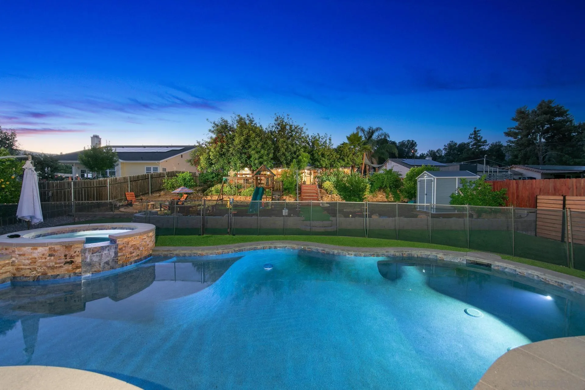 23849 Gymkhana Road Ramona, CA 92065 - Photo 22 of 57 a view of a swimming pool with a patio