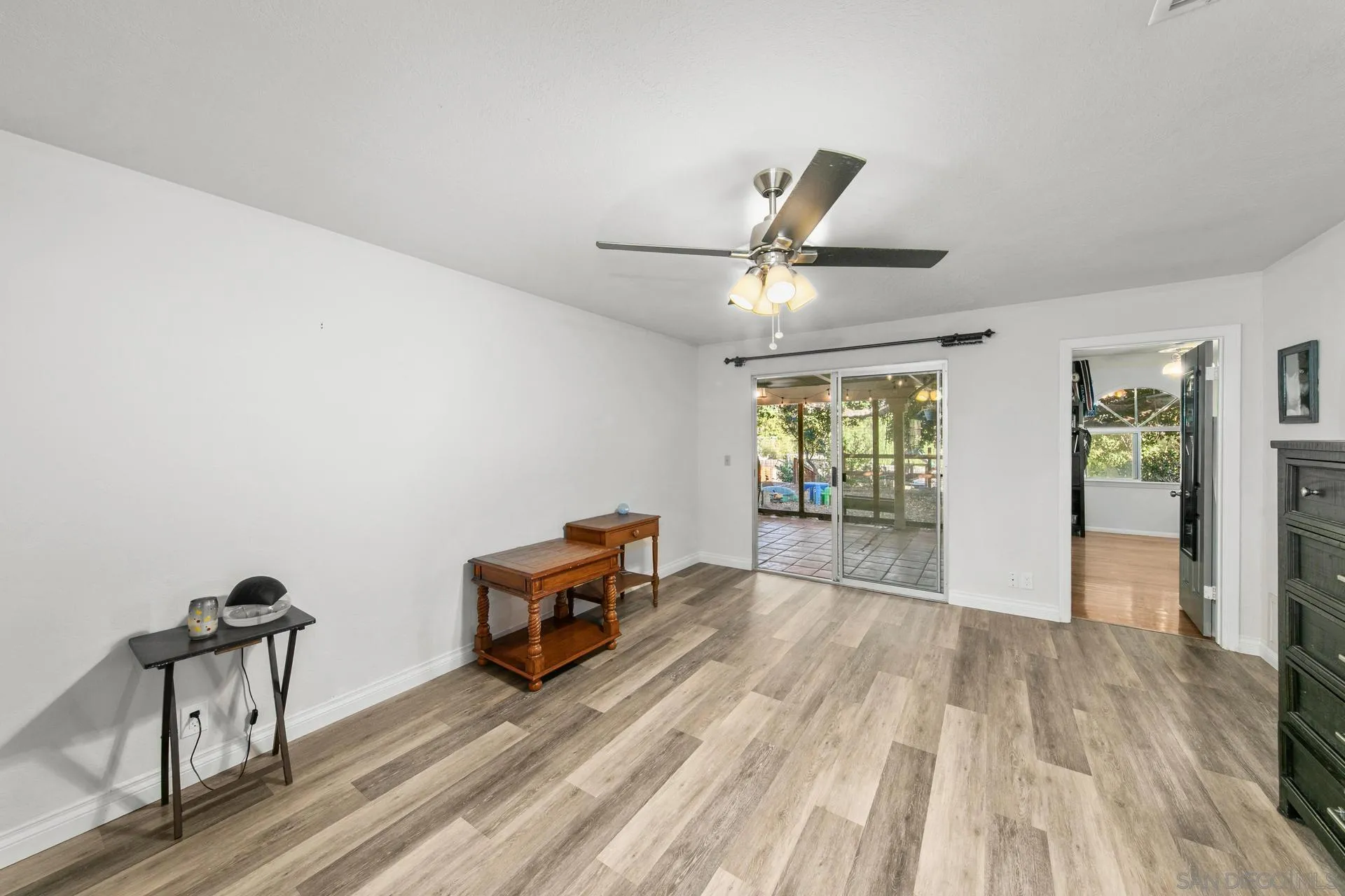 23849 Gymkhana Road Ramona, CA 92065 - Photo 29 of 57 a view of workspace with wooden floor and ceiling fan