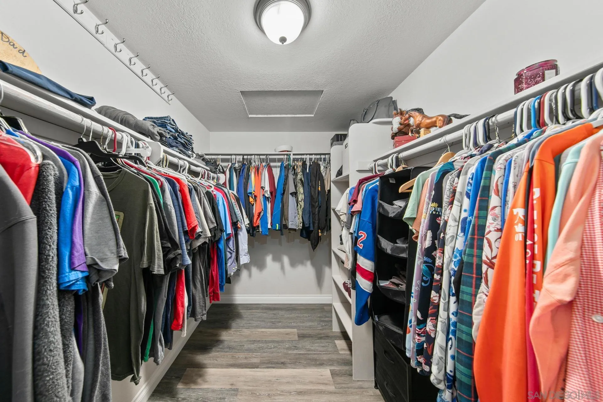 23849 Gymkhana Road Ramona, CA 92065 - Photo 31 of 57 a view of walk in closet with clothes