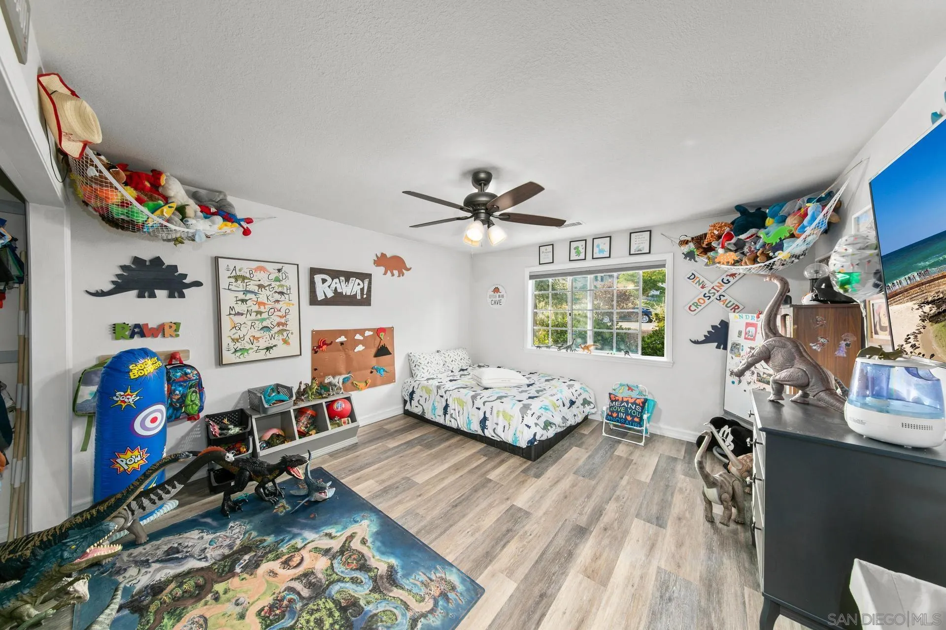 23849 Gymkhana Road Ramona, CA 92065 - Photo 36 of 57 a bed room with furniture and a window