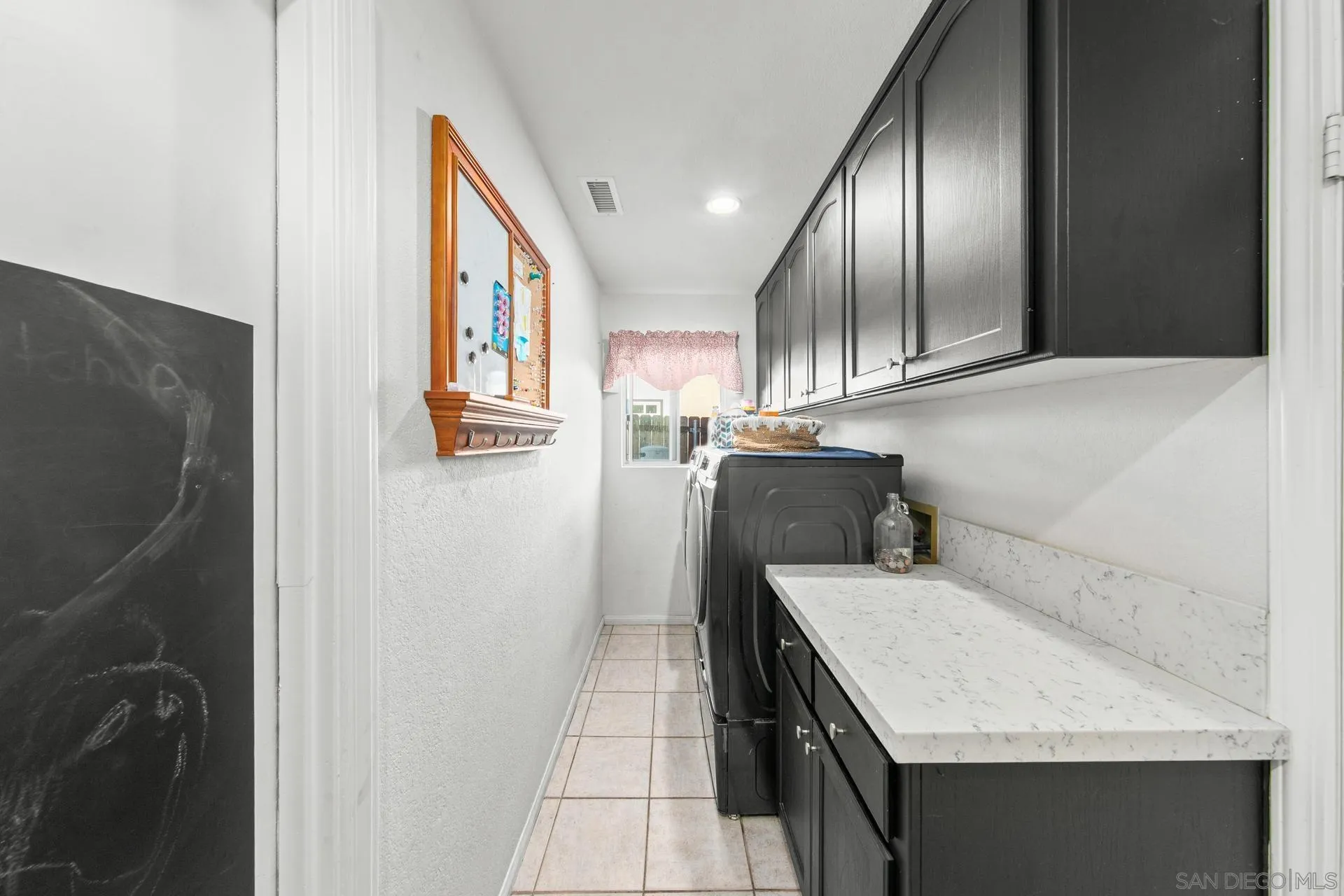 23849 Gymkhana Road Ramona, CA 92065 - Photo 43 of 57 a kitchen with stainless steel appliances granite countertop a sink and dishwasher