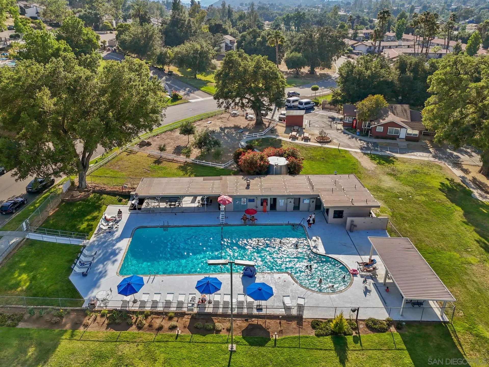 23849 Gymkhana Road Ramona, CA 92065 - Photo 52 of 57 an aerial view of a swimming pool patio and mountain view