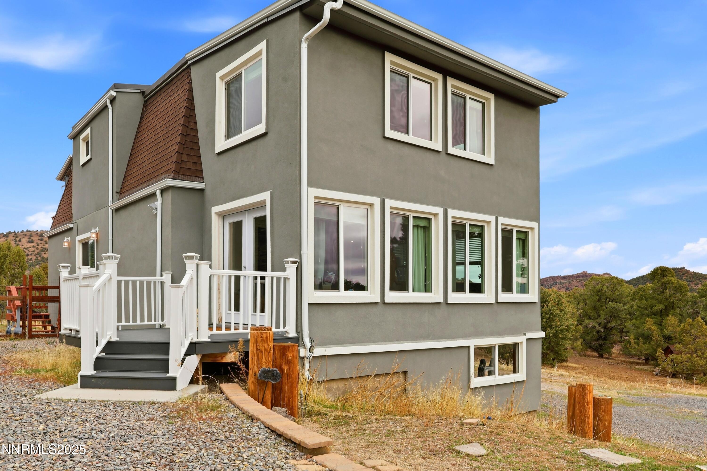 1590 Combination Road Reno, NV 89521 - Photo 2 of 41 a front view of a house with a yard