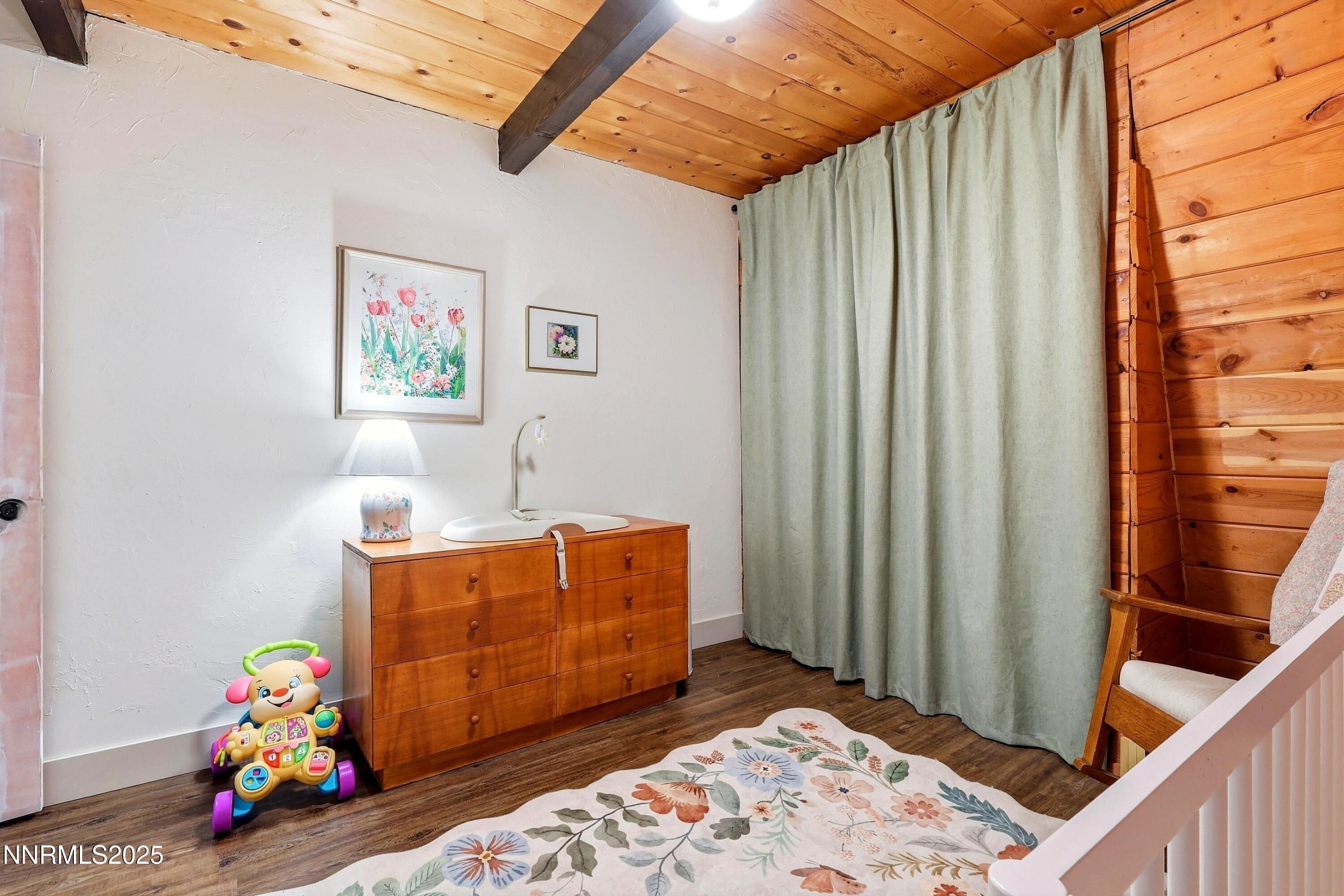 1590 Combination Road Reno, NV 89521 - Photo 27 of 41 a room with toys and wooden floor