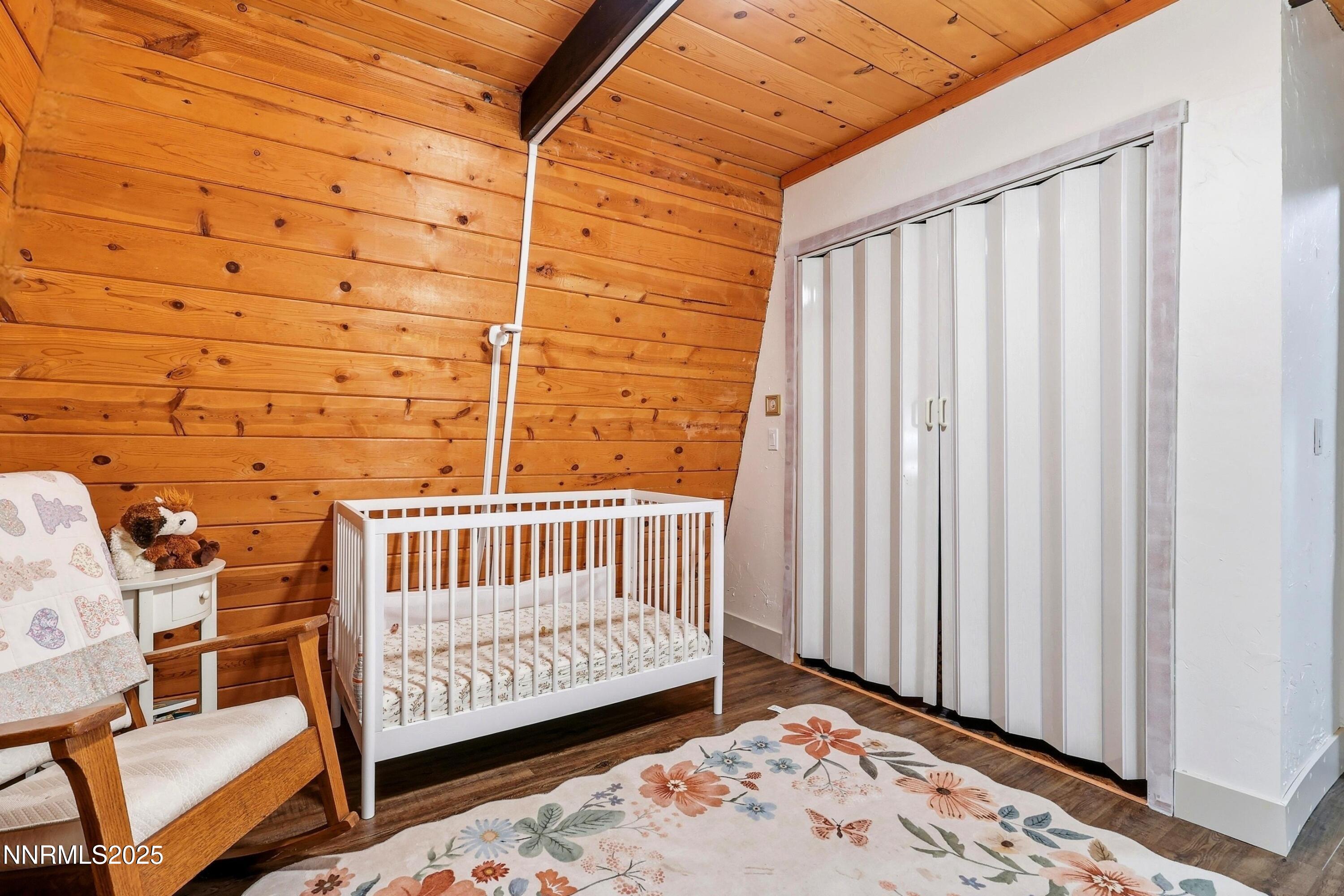 1590 Combination Road Reno, NV 89521 - Photo 28 of 41 a bedroom with a chair and a window