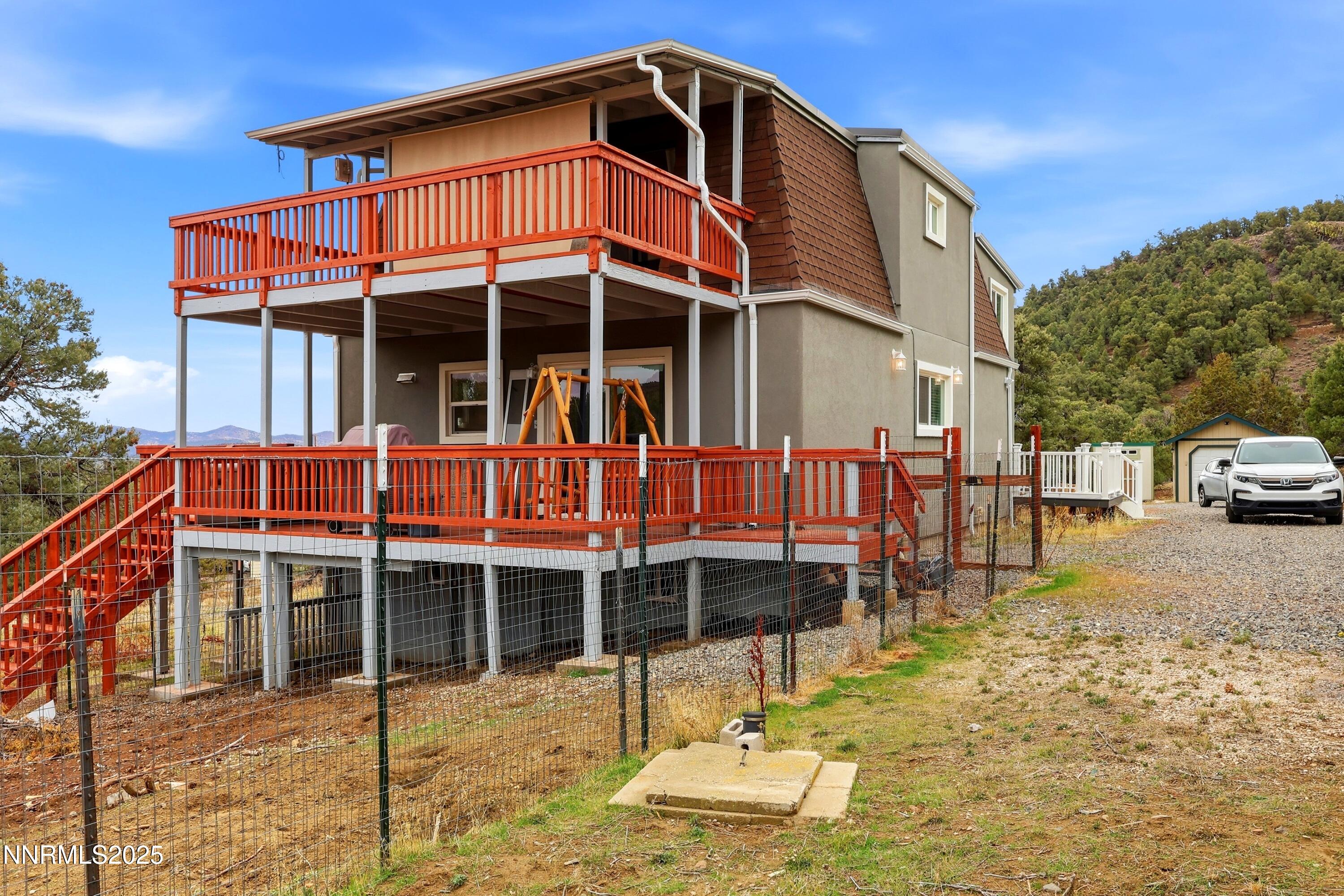 1590 Combination Road Reno, NV 89521 - Photo 3 of 41 a front view of a house with a yard