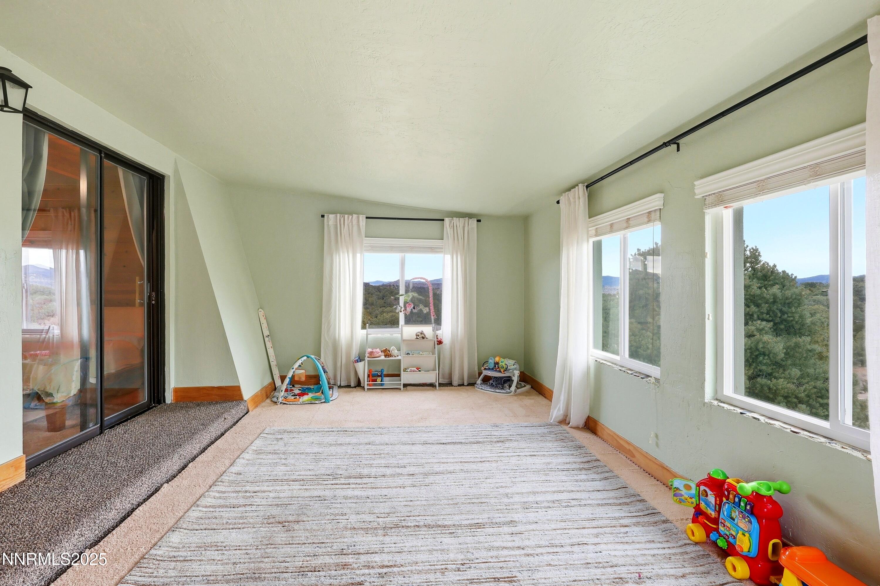 1590 Combination Road Reno, NV 89521 - Photo 35 of 41 a view of an empty room with a window