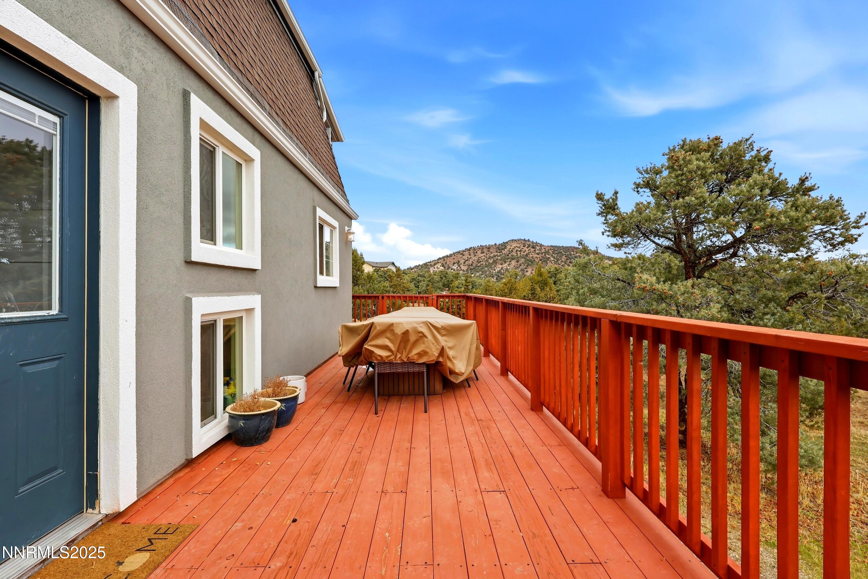 1590 Combination Road Reno, NV 89521 - Photo 6 of 41 a balcony with wooden floor and city view