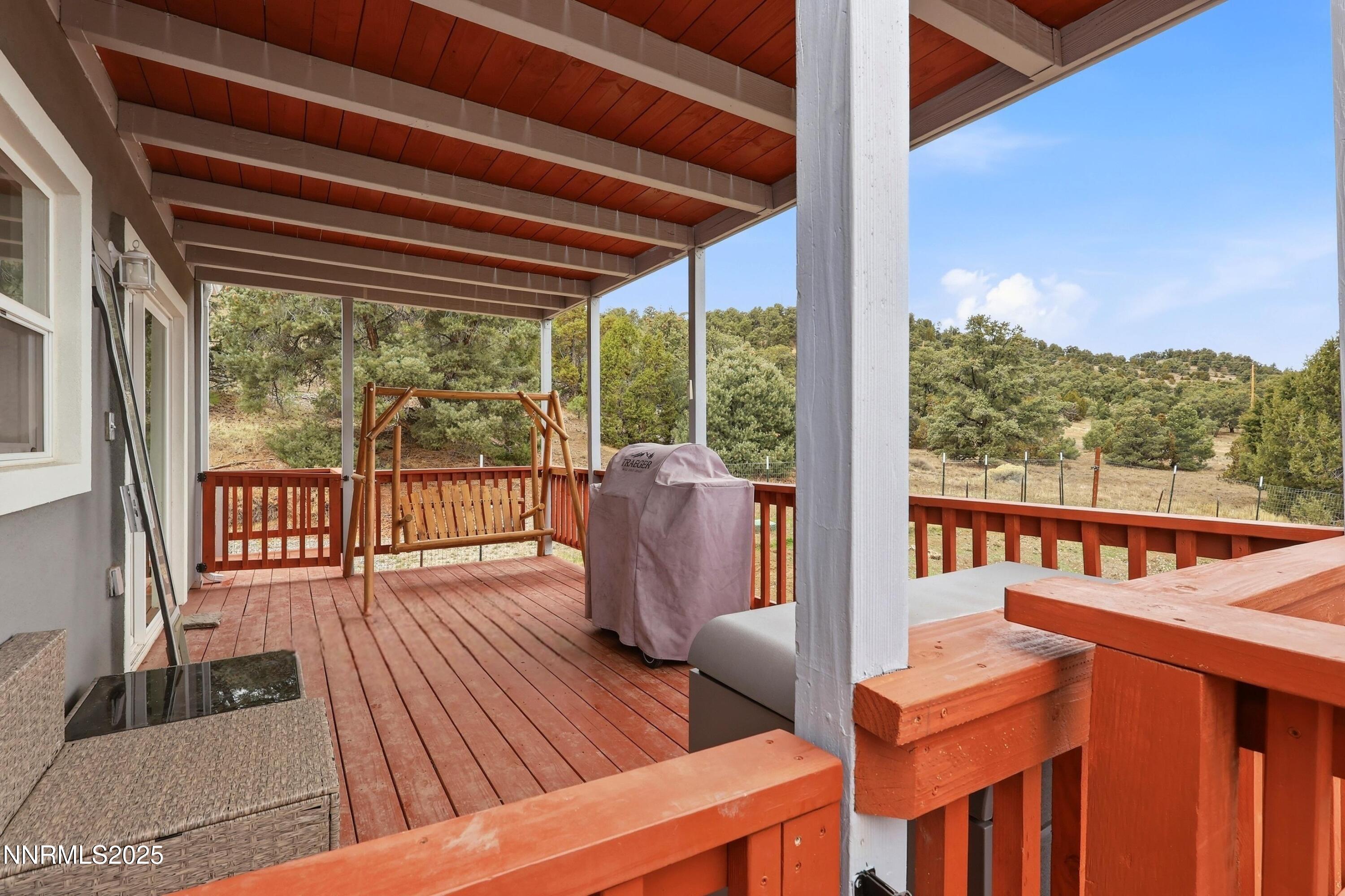 1590 Combination Road Reno, NV 89521 - Photo 8 of 41 a view of a chair and tables in the balcony