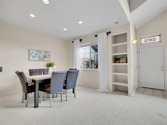 a view of a dining room with furniture