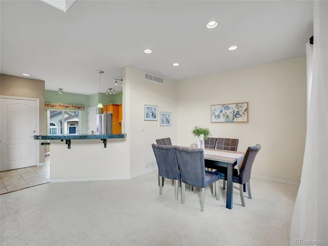 a view of a dining room with furniture