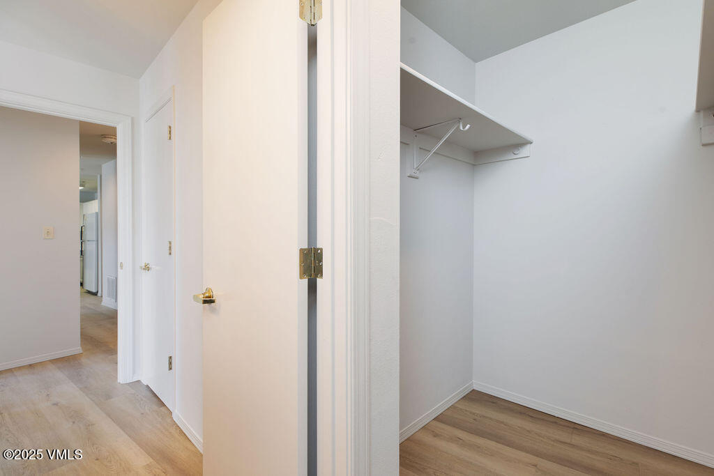 34295 Highway 6, Unit 201 Edwards, CO 81632 - Photo 11 of 15 a view of a hallway with wooden floor