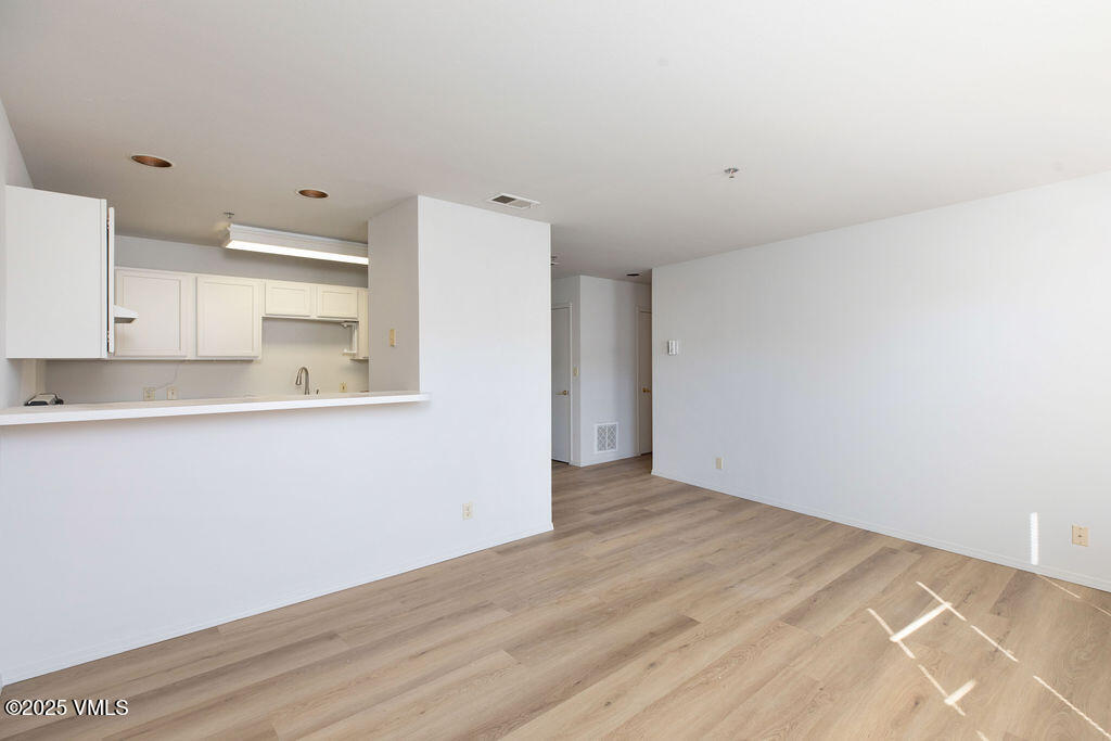 34295 Highway 6, Unit 201 Edwards, CO 81632 - Photo 2 of 15 a view of kitchen and wooden floor