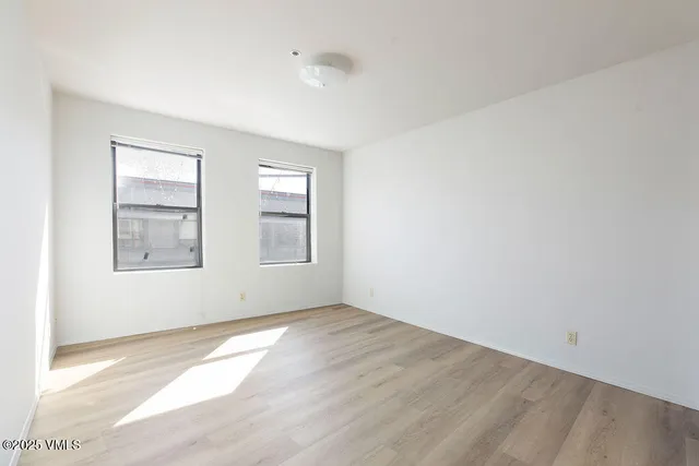 an empty room with windows