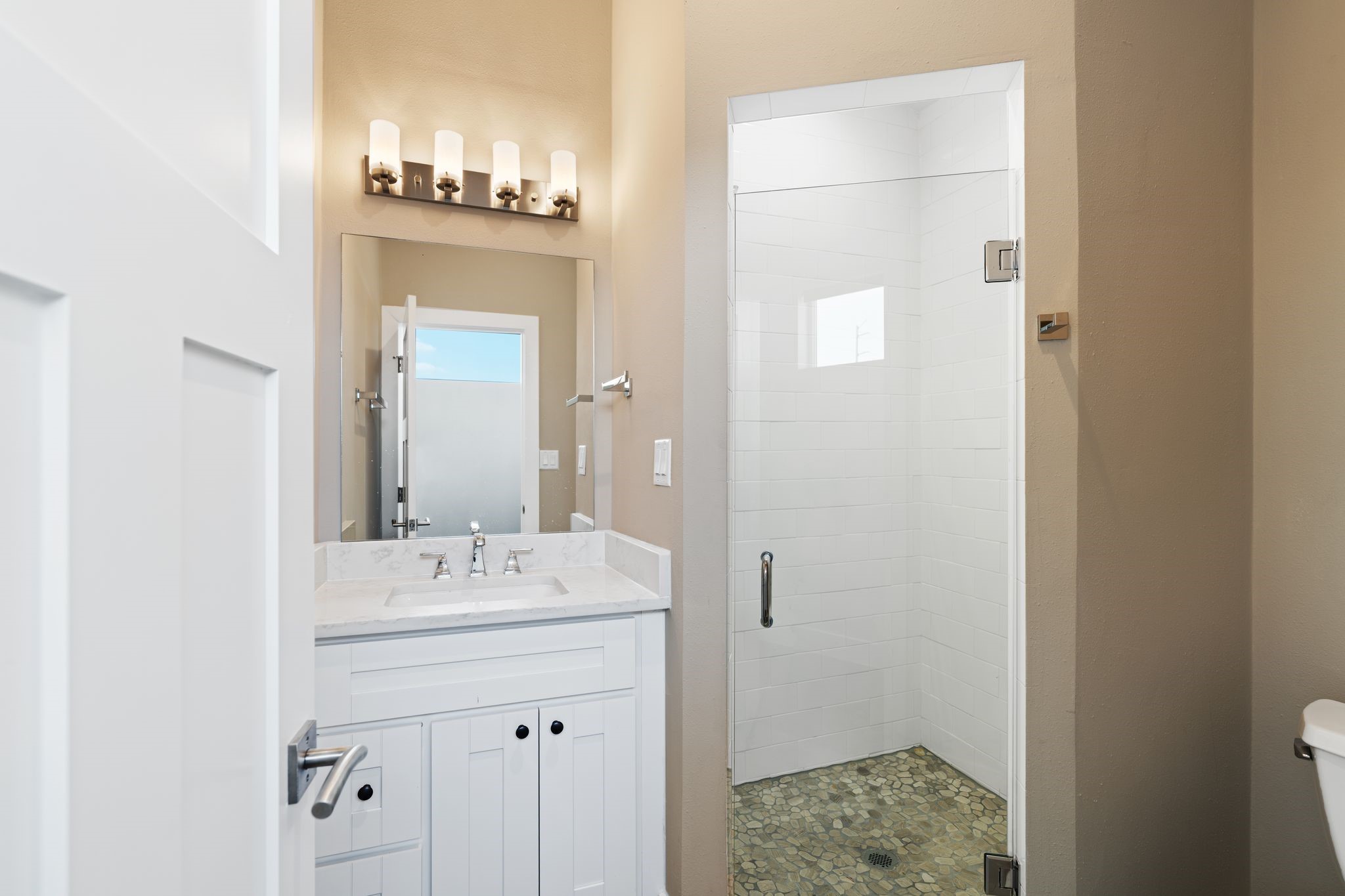 807 Nicholson Street Houston, TX 77007 - Photo 28 of 30 A well-designed vanity and walk-in shower completing this third-floor retreat.