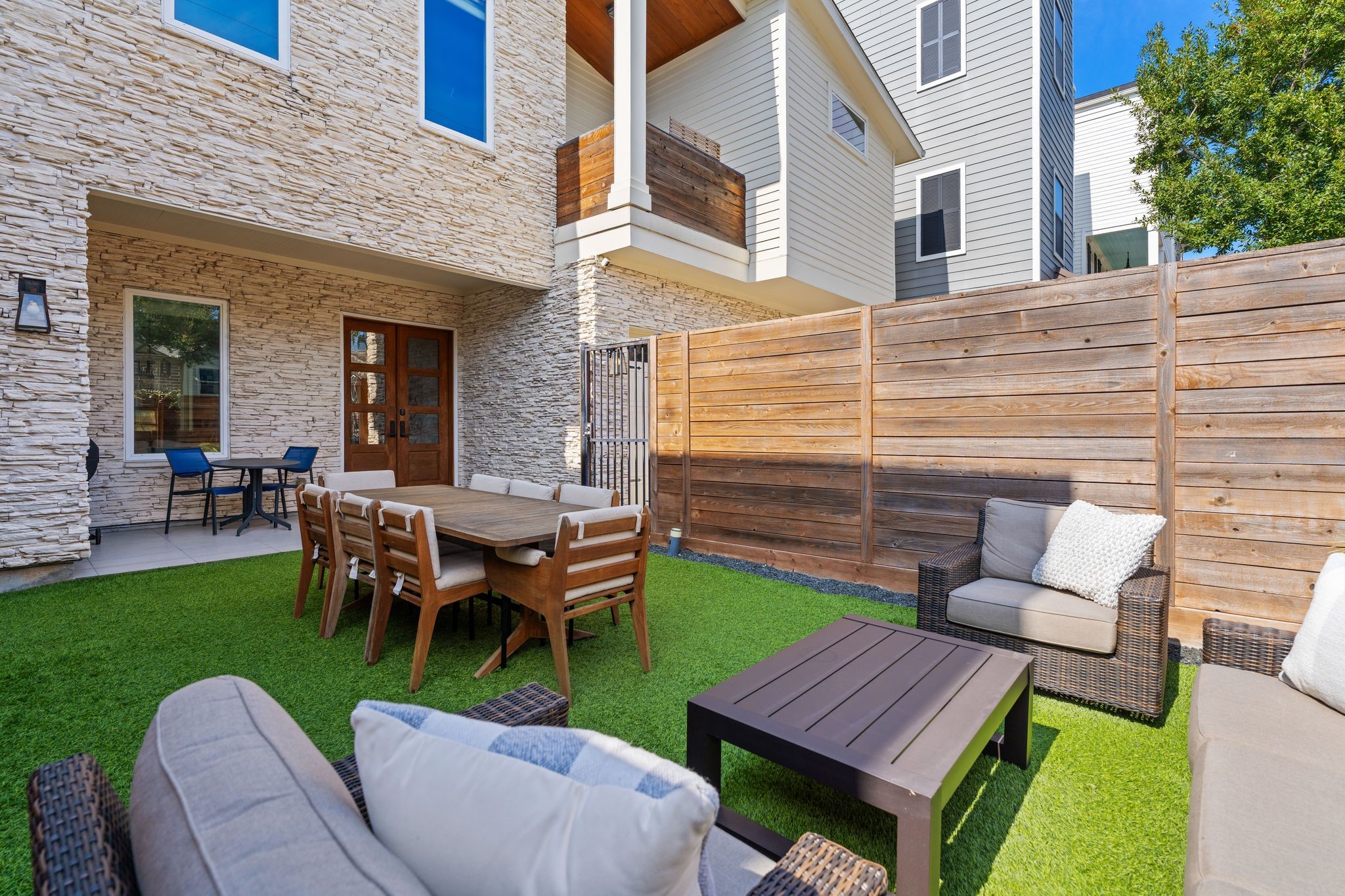 807 Nicholson Street Houston, TX 77007 - Photo 3 of 30 A sizable, fully fenced yard with low-maintenance turf and exceptional privacy.