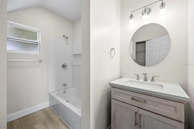 a view of a livingroom with a hardwood floor