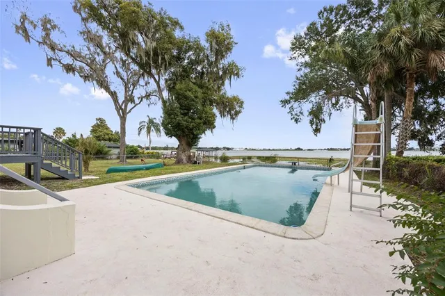 a city street lined with buildings and trees