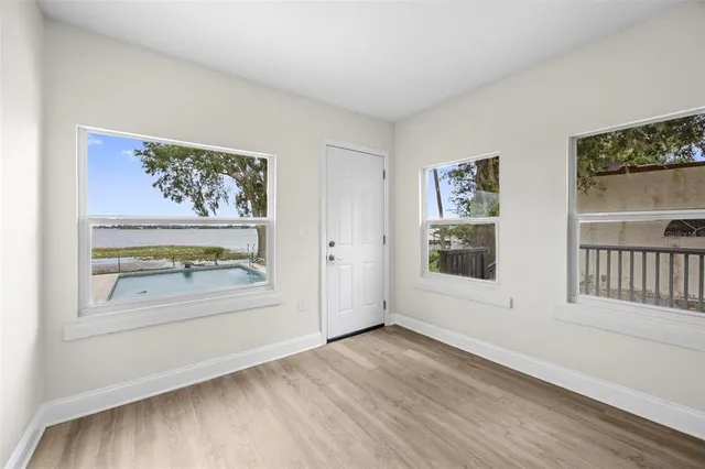 a kitchen with stainless steel appliances a refrigerator sink and microwave