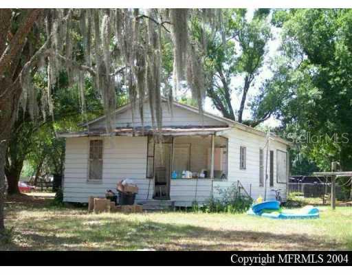 3625 Jordan Road Dover, FL 33527 - Photo 1 of 1 a view of a house with a yard