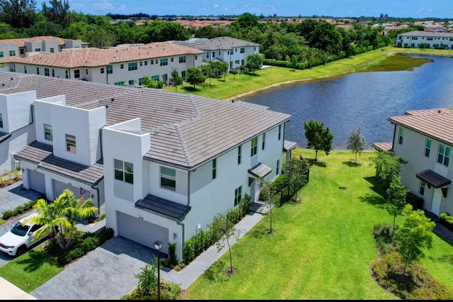 an aerial view of a house with a garden