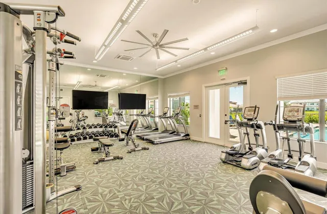 a view of a livingroom with furniture and a flat screen tv