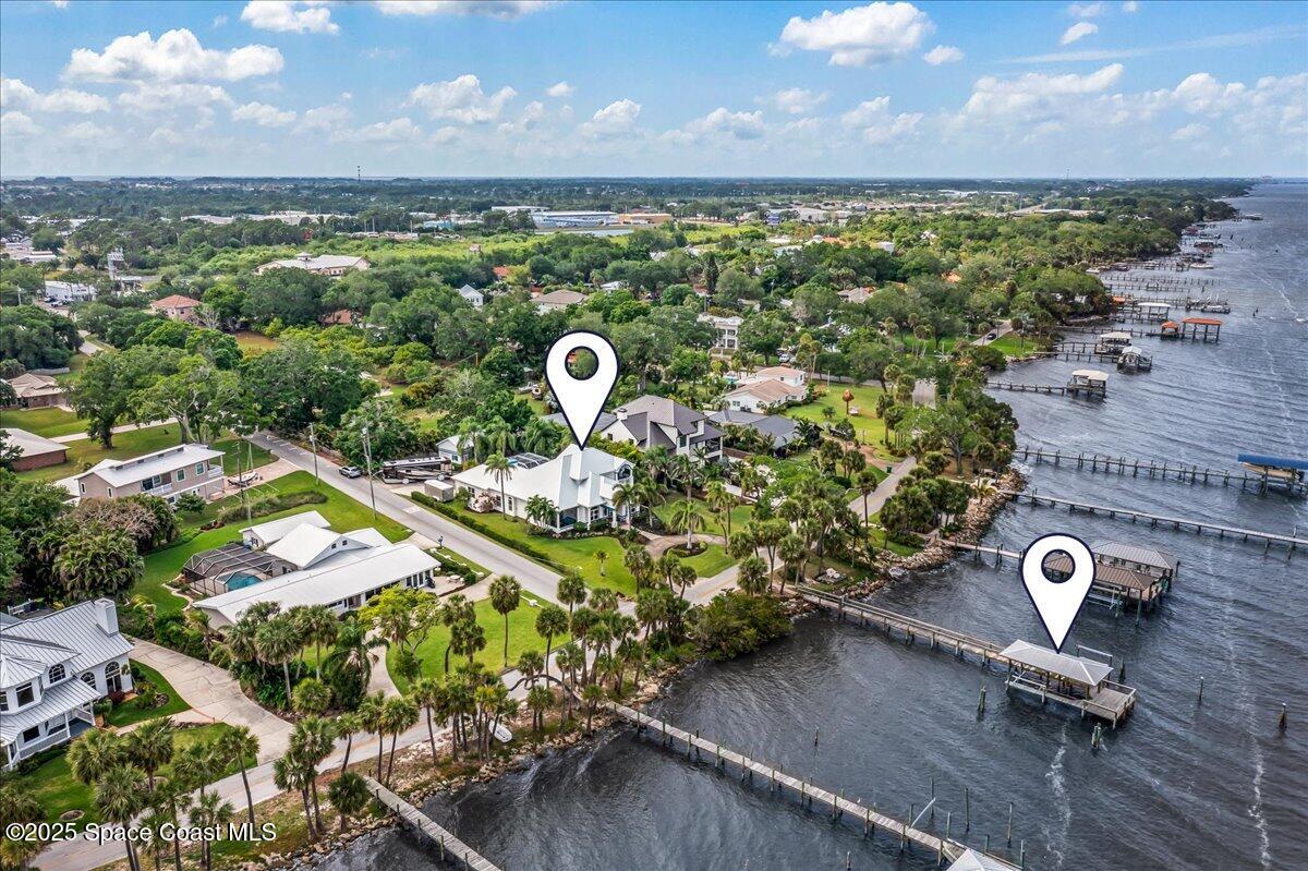 2089 Rockledge Drive Rockledge, FL 32955 - Photo 1 of 60 an aerial view of a house with a swimming pool yard and outdoor seating