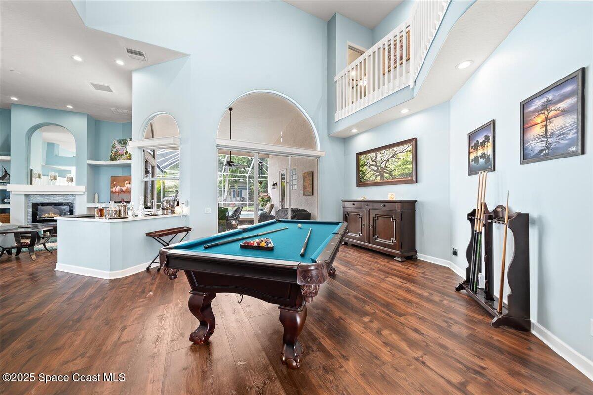 2089 Rockledge Drive Rockledge, FL 32955 - Photo 11 of 60 a room with furniture pool table flat screen tv and windows
