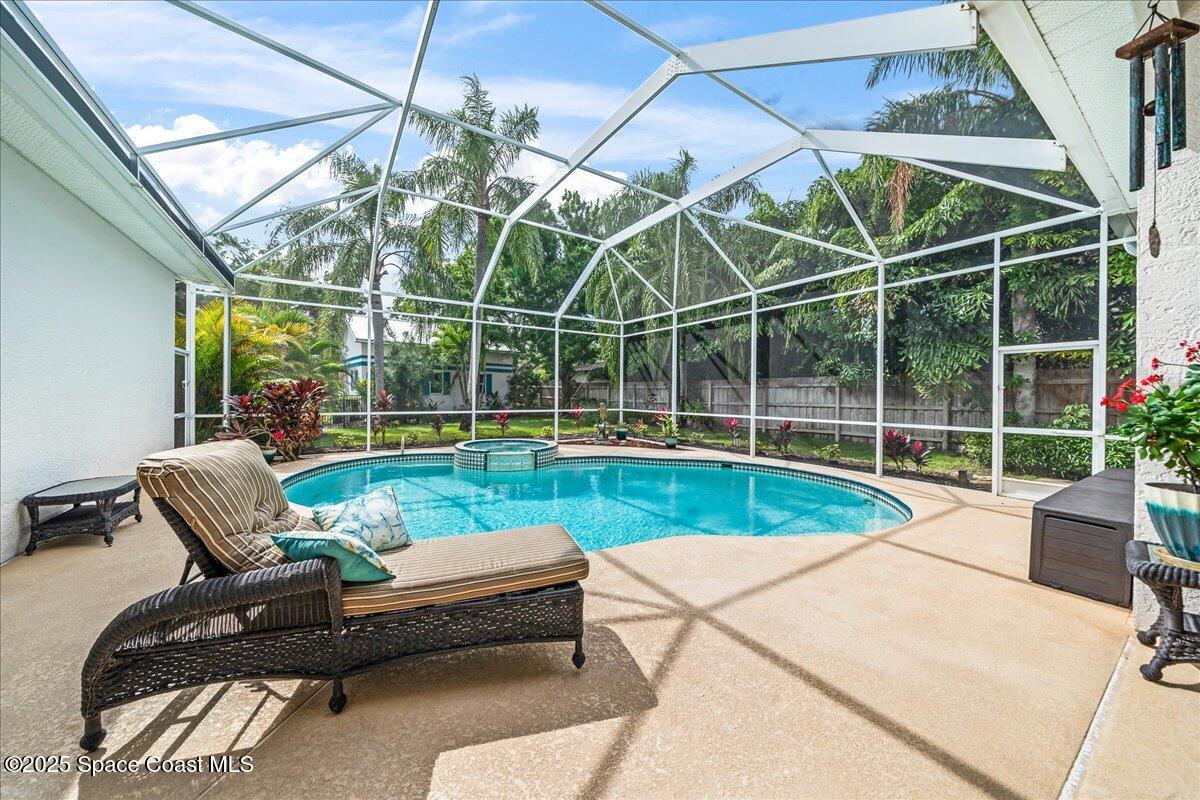 2089 Rockledge Drive Rockledge, FL 32955 - Photo 30 of 60 a view of swimming pool with outdoor seating and patio