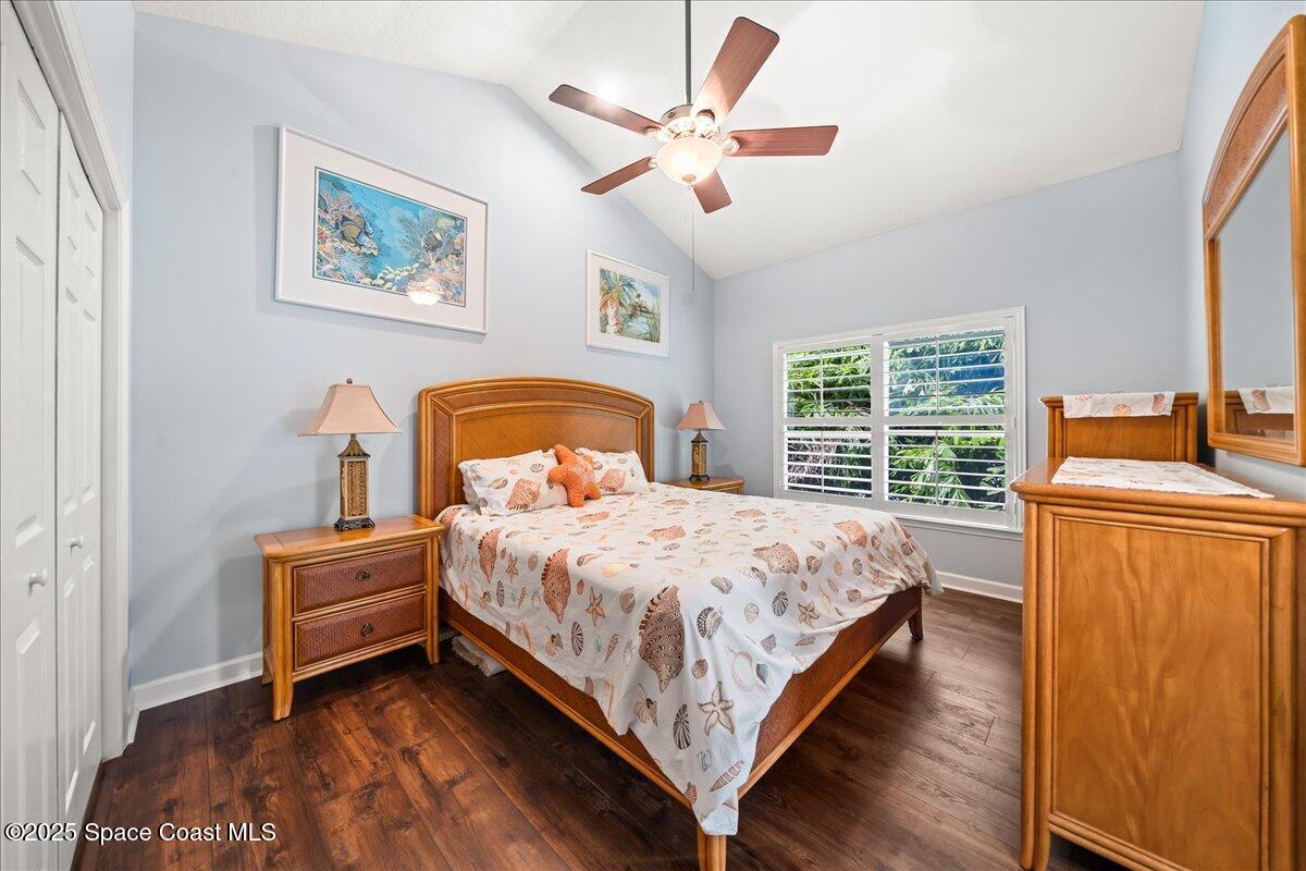 2089 Rockledge Drive Rockledge, FL 32955 - Photo 35 of 60 a bedroom with a bed and a large window