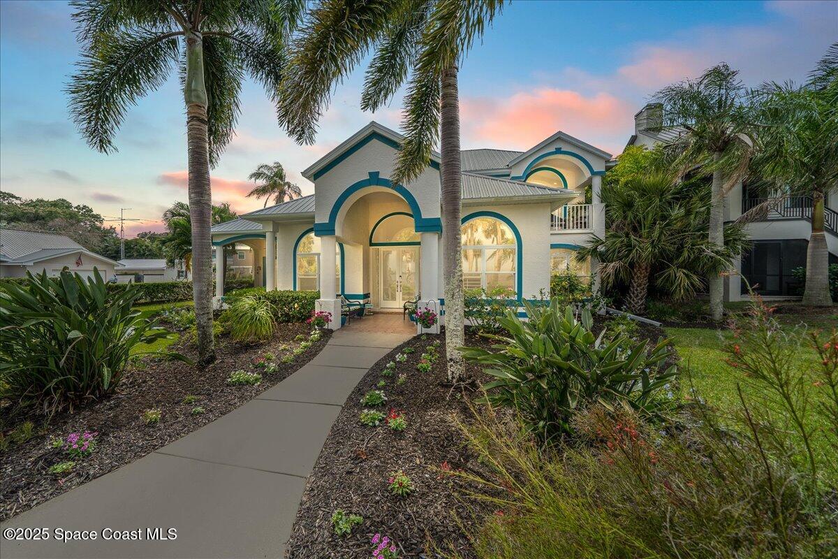 2089 Rockledge Drive Rockledge, FL 32955 - Photo 4 of 60 a front view of a house with garden