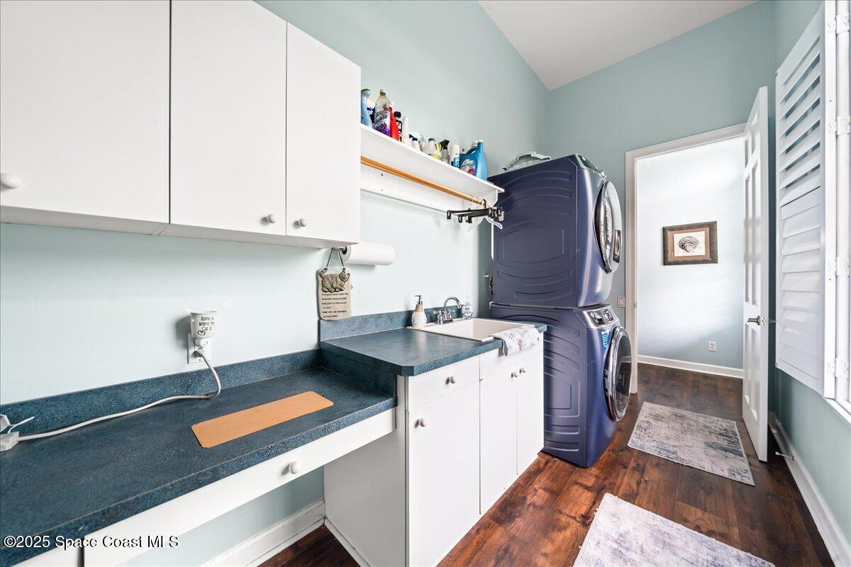 2089 Rockledge Drive Rockledge, FL 32955 - Photo 42 of 60 a kitchen with stainless steel appliances granite countertop a stove a sink and a refrigerator