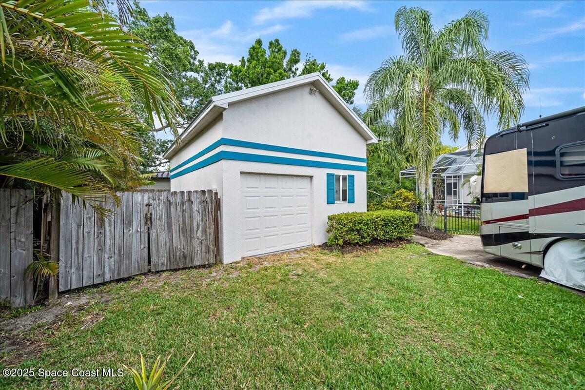 2089 Rockledge Drive Rockledge, FL 32955 - Photo 43 of 60 a house that has a tree in front of the house