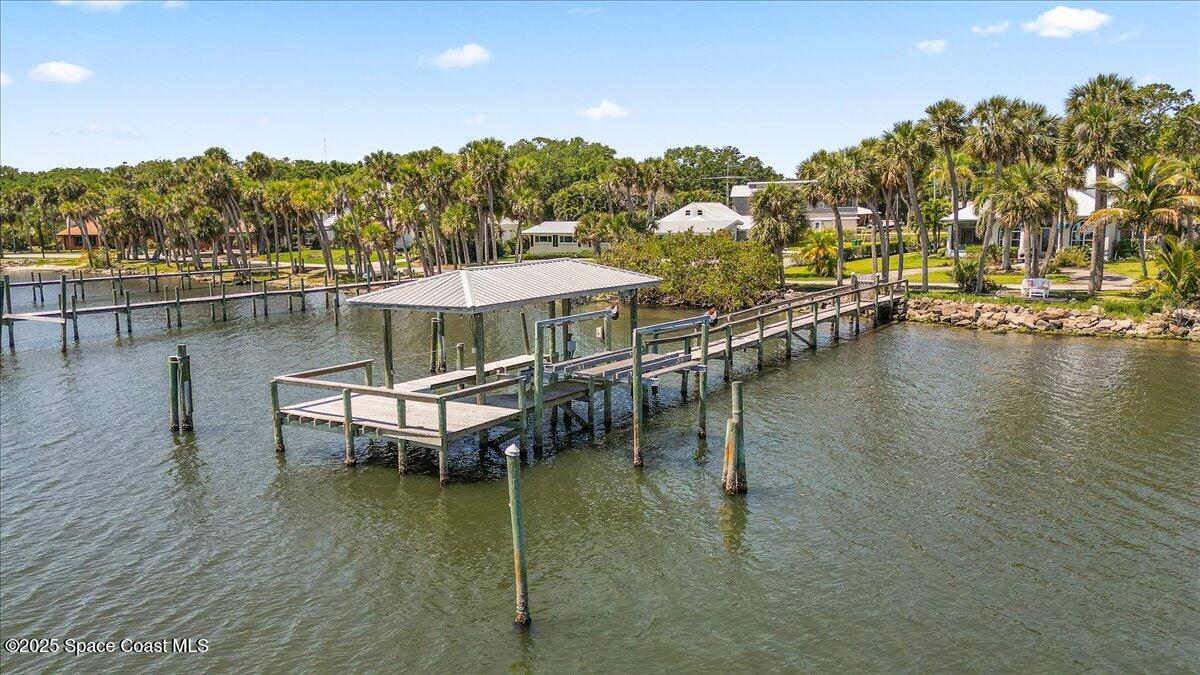 2089 Rockledge Drive Rockledge, FL 32955 - Photo 5 of 60 a view of a lake with a mountain