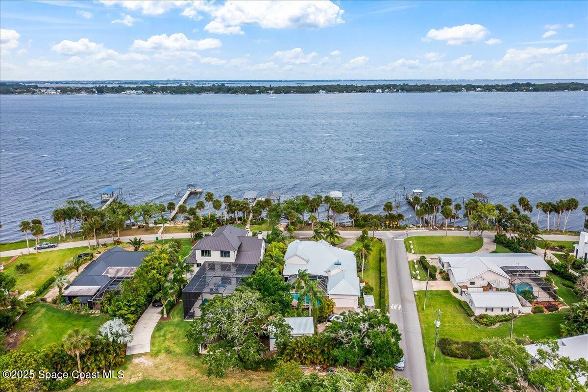 2089 Rockledge Drive Rockledge, FL 32955 - Photo 54 of 60 an aerial view of beach and residential houses with outdoor space