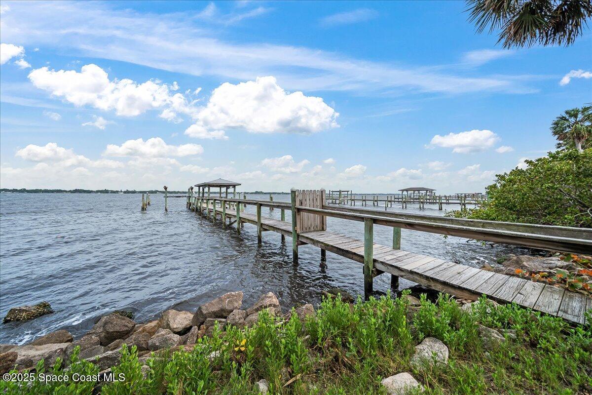 2089 Rockledge Drive Rockledge, FL 32955 - Photo 60 of 60 a view of a terrace with a bench