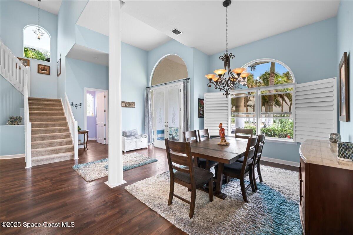 2089 Rockledge Drive Rockledge, FL 32955 - Photo 7 of 60 a view of a dining room with furniture window and wooden floor