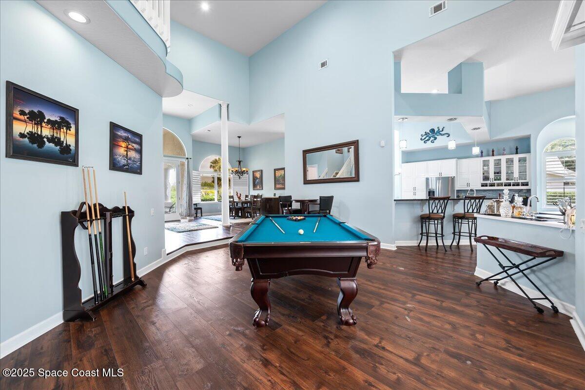 2089 Rockledge Drive Rockledge, FL 32955 - Photo 10 of 60 a living room with furniture and a flat screen tv
