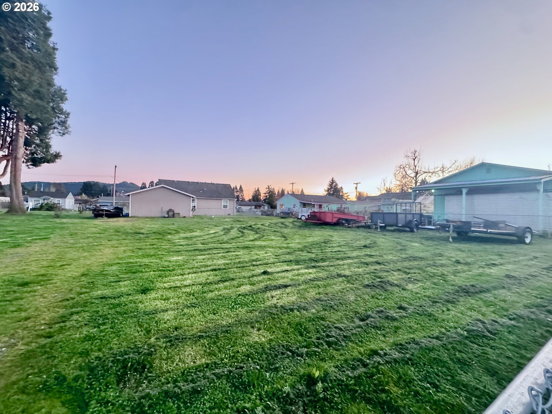 3720 Virginia Avenue Springfield, OR 97478 - Photo 3 of 4 a view of a house with a yard and a fountain