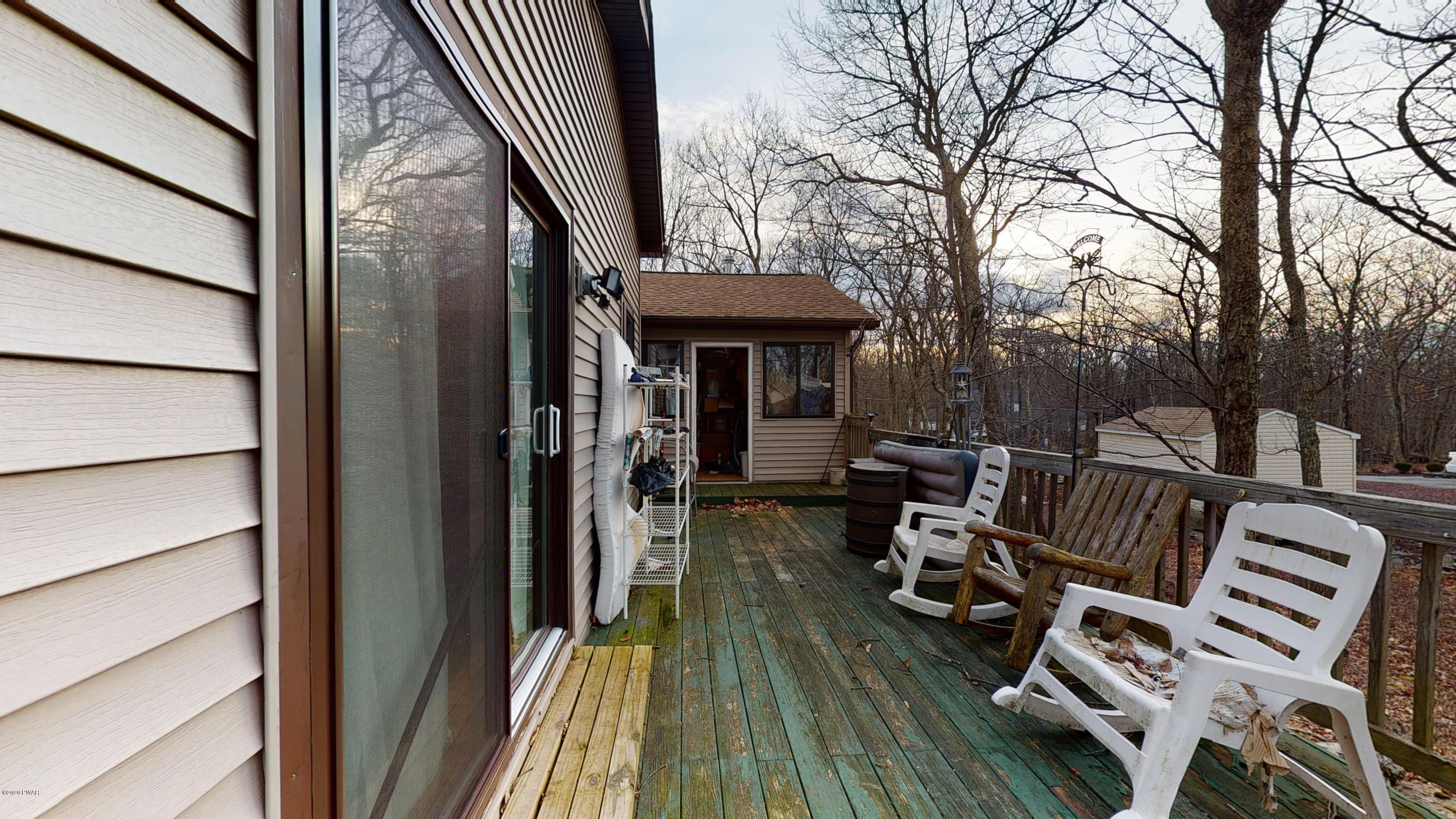 130 Maple Ridge Road Milford, PA 18337 - Photo 30 of 44 a view of balcony with wooden floor and outdoor seating