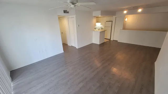 a hallway with washer and dryer