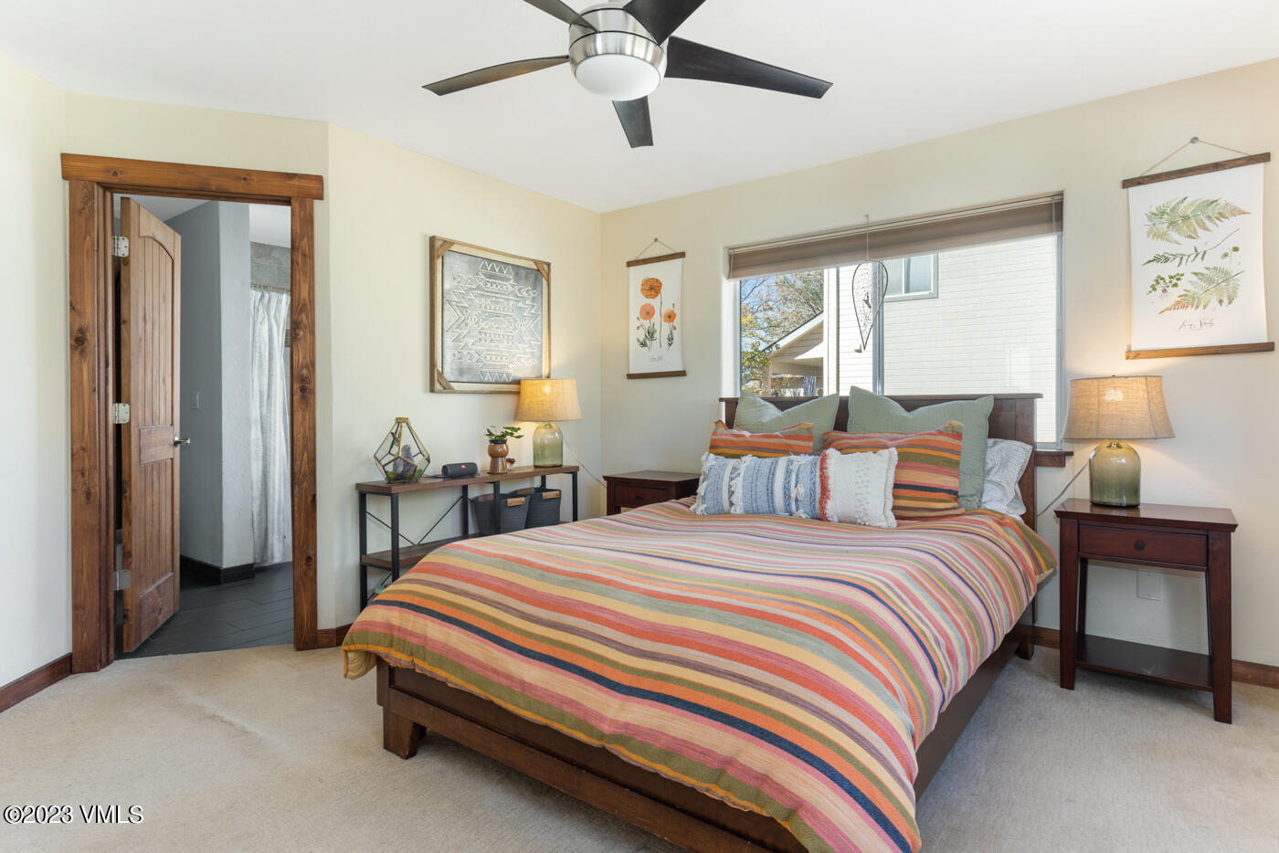 320 Golden Eagle Eagle, CO 81631 - Photo 12 of 26 a bedroom with a bed and window